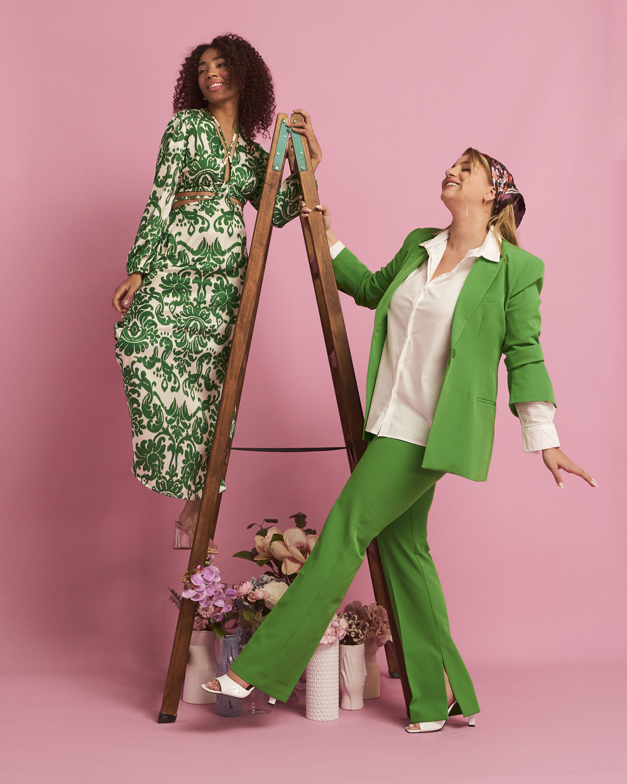 women green suit and green maxi dress